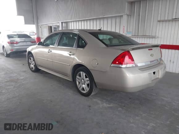 2011 Chevrolet Impala LT Retail with VIN 2G1WB5EK2B1201278, listed as a IAAI auction lot 43370195 with 141,685 mi miles and . Bid and sale history available at DreamBid. Image 3.