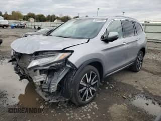 2020 Honda Pilot Touring 8-Passenger z VIN 5FNYF6H92LB010073, wystawiony jako Copart lot #89854985 z przebiegiem 28 856 mil mil oraz Szkoda całkowita • Salvage title. Historia ofert i sprzedaży dostępna na DreamBid. Obrazek 1.