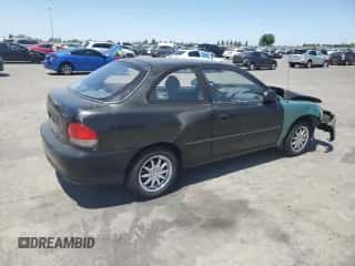 1999 Hyundai Accent L z VIN KMHVD14N4XU428030, wystawiony jako Copart lot #65271195 z przebiegiem 151 064 mil mil oraz Szkoda całkowita • Salvage title. Historia ofert i sprzedaży dostępna na DreamBid. Obrazek 3.
