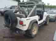 1990 Jeep Wrangler with VIN 2J4FY29T4LJ544063, listed as a IAAI auction lot 42414414 with 145,546 mi miles and . Bid and sale history available at DreamBid. Image 4.