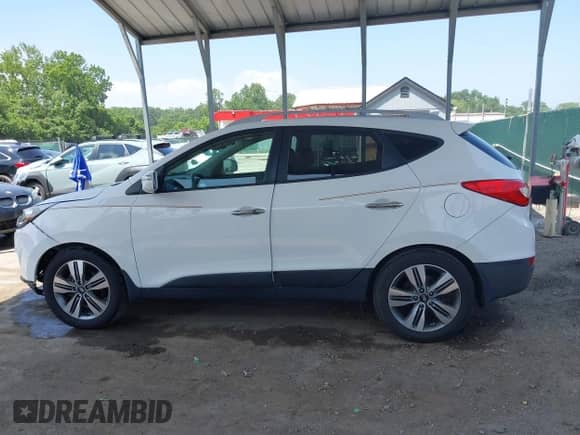 2015 Hyundai Tucson Limited z VIN KM8JUCAG3FU092093, wystawiony jako IAAI lot #42451431 z przebiegiem 91 649 mil mil oraz . Historia ofert i sprzedaży dostępna na DreamBid. Obrazek 14.