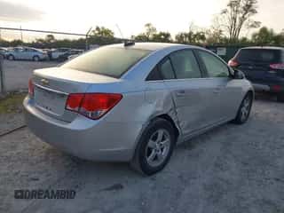 2016 Chevrolet Cruze LT z VIN 1G1PE5SB0G7218963, wystawiony jako IAAI lot #43431392 z przebiegiem 157 746 mil mil oraz . Historia ofert i sprzedaży dostępna na DreamBid. Obrazek 4.