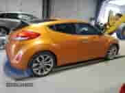 2014 Hyundai Veloster z VIN KMHTC6AD4EU212324, wystawiony jako Copart lot #71514455 z przebiegiem 120 419 mil mil oraz Czysty tytuł • Clean title. Historia ofert i sprzedaży dostępna na DreamBid. Obrazek 3.