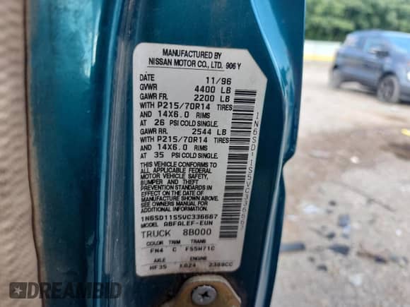 1997 Nissan Frontier XE with VIN 1N6SD11S5VC336667, listed as a Copart auction lot 64675695 with 179,754 mi miles and Salvage title. Bid and sale history available at DreamBid. Image 12.