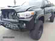2016 Toyota Tacoma SR z VIN 5TFCZ5AN8GX002137, wystawiony jako IAAI lot #43262454 z przebiegiem 187 414 mil mil oraz . Historia ofert i sprzedaży dostępna na DreamBid. Obrazek 18.