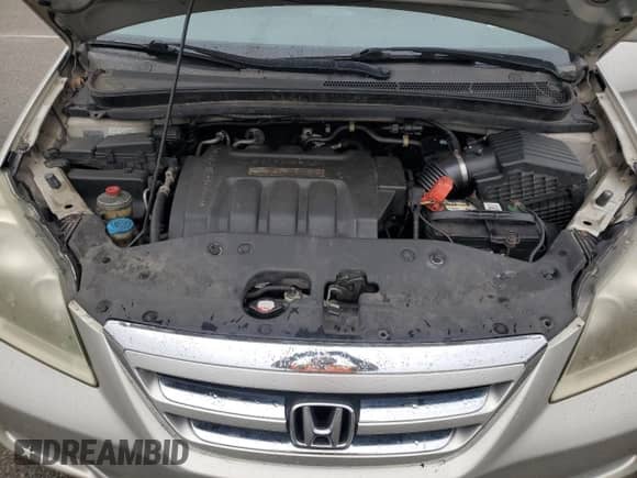 2007 Honda Odyssey EX-L с VIN 5FNRL38787B415077, выставлен на аукционе Copart как лот 90330325 с пробегом 182 719 миль миль и Списание • Salvage title. История ставок и продаж доступна на DreamBid. Изображение 12.