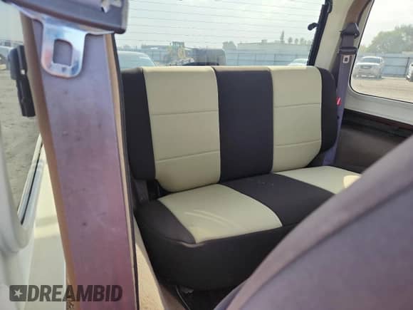 2002 Jeep Wrangler Sahara z VIN 1J4FA59S62P706936, wystawiony jako Copart lot #86420315 z przebiegiem 117 025 mil mil oraz Szkoda całkowita • Salvage title. Historia ofert i sprzedaży dostępna na DreamBid. Obrazek 10.