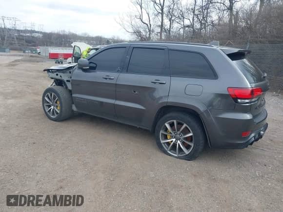 2018 Jeep Grand Cherokee Trackhawk с VIN 1C4RJFN90JC437656, выставлен на аукционе IAAI как лот 41518770 с пробегом 101 768 миль миль и . История ставок и продаж доступна на DreamBid. Изображение 3.