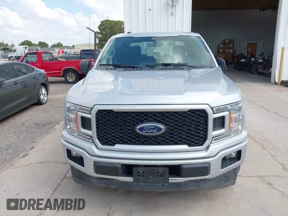 2018 Ford F-150 XL with VIN 1FTEW1CP2JFD42938, listed as a IAAI auction lot 42654180 with 119,099 mi miles and . Bid and sale history available at DreamBid. Image 12.