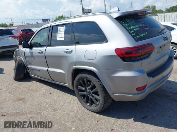 2018 Jeep Grand Cherokee Altitude with VIN 1C4RJEAG7JC181921, listed as a IAAI auction lot 43208554 with 157,255 mi miles and . Bid and sale history available at DreamBid. Image 3.