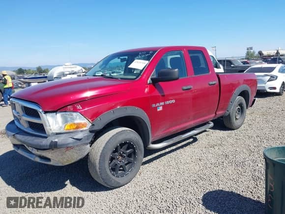 2012 Ram 1500 ST z VIN 1C6RD7FP2CS307470, wystawiony jako IAAI lot #43129719 z przebiegiem 131 305 mil mil oraz . Historia ofert i sprzedaży dostępna na DreamBid. Obrazek 19.