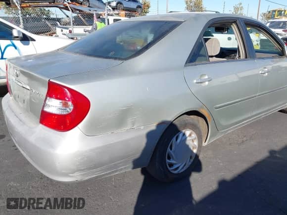 2002 Toyota Camry LE с VIN JTDBE32K820112980, выставлен на аукционе IAAI как лот 43497891 с пробегом 146 705 миль миль и . История ставок и продаж доступна на DreamBid. Изображение 6.