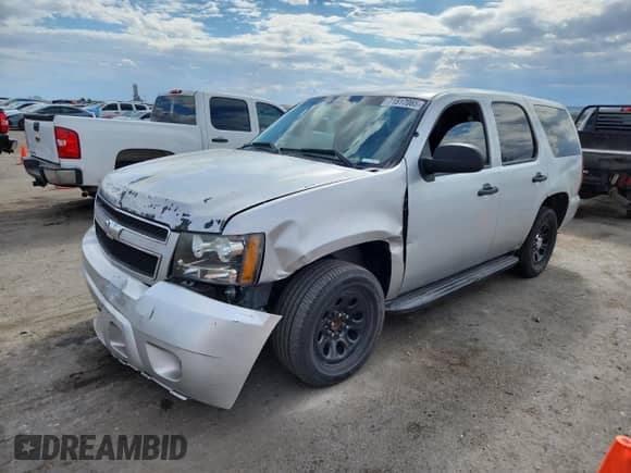 2011 Chevrolet Tahoe Commercial z VIN 1GNLC2E04BR333185, wystawiony jako Copart lot #71517065 z przebiegiem 202 927 mil mil oraz Szkoda całkowita • Salvage title. Historia ofert i sprzedaży dostępna na DreamBid. Obrazek 1.