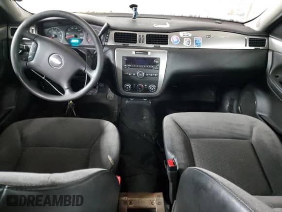 2013 Chevrolet Impala Police with VIN 2G1WD5E30D1261680, listed as a Copart auction lot 85213524 with 150,106 mi miles and Salvage title. Bid and sale history available at DreamBid. Image 8.