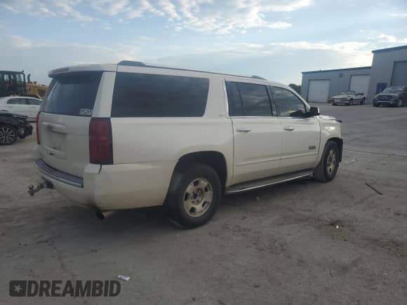2015 Chevrolet Suburban LTZ with VIN 1GNSCKKCXFR571171, listed as a Copart auction lot 81972825 with 189,848 mi miles and Salvage title. Bid and sale history available at DreamBid. Image 3.