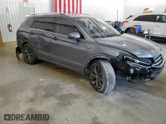 2022 Volkswagen Tiguan SE z VIN 3VV3B7AX1NM151012, wystawiony jako Copart lot #80038775 z przebiegiem 87 534 mil mil oraz Szkoda całkowita • Salvage title. Historia ofert i sprzedaży dostępna na DreamBid. Obrazek 4.