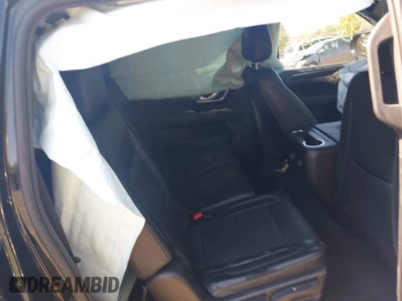 2023 Chevrolet Suburban LS z VIN 1GNSKBKD3PR165715, wystawiony jako IAAI lot #43253479 z przebiegiem 132 431 mil mil oraz . Historia ofert i sprzedaży dostępna na DreamBid. Obrazek 8.