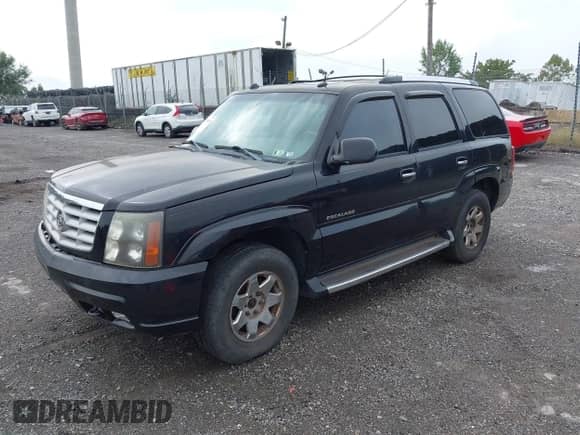 2004 Cadillac Escalade z VIN 1GYEK63N84R287562, wystawiony jako IAAI lot #43278263 z przebiegiem 201 573 mil mil oraz . Historia ofert i sprzedaży dostępna na DreamBid. Obrazek 2.