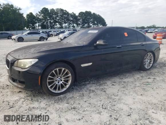 2013 BMW 7 Series 750i с VIN WBAYA8C58DC996414, выставлен на аукционе Copart как лот 62928835 с пробегом 174 807 миль миль и Чистый • Clean title. История ставок и продаж доступна на DreamBid. Изображение 1.