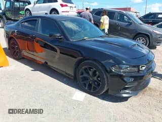2019 Dodge Charger R/T z VIN 2C3CDXCT7KH575148, wystawiony jako IAAI lot #43322340 z przebiegiem 116 297 mil mil oraz . Historia ofert i sprzedaży dostępna na DreamBid. Obrazek 1.