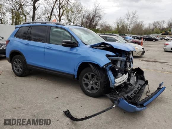 2025 Honda Passport TrailSport with VIN 5FNYF8H69SB001998, listed as a Copart auction lot 51595415 with 3,336 mi miles and Salvage title. Bid and sale history available at DreamBid. Image 4.