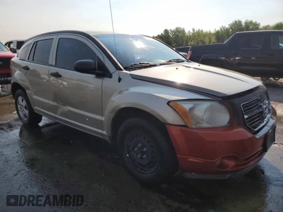 2009 Dodge Caliber SE with VIN 1B3HB28A99D151772, listed as a Copart auction lot 66681595 with 189,648 mi miles and Salvage title. Bid and sale history available at DreamBid. Image 4.