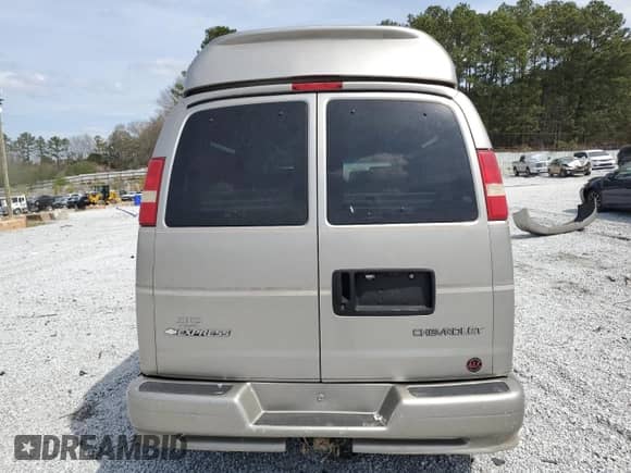 2004 Chevrolet Express Passenger с VIN 1GBFG15TX41155433, выставлен на аукционе Copart как лот 48826455 с пробегом 327 969 миль миль и Списание • Salvage title. История ставок и продаж доступна на DreamBid. Изображение 6.