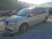 2013 Dodge Grand Caravan SXT with VIN 2C4RDGCG1DR575507, listed as a Copart auction lot 80065985 with 185,478 mi miles and Salvage title. Bid and sale history available at DreamBid. Image 1.