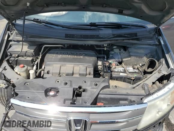 2011 Honda Odyssey Touring с VIN 5FNRL5H91BB089547, выставлен на аукционе Copart как лот 72002965 с пробегом 196 723 миль миль и Списание • Salvage title. История ставок и продаж доступна на DreamBid. Изображение 12.