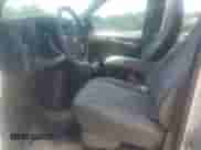 2014 Chevrolet Express Passenger LT с VIN 1GAZG1FGXE1178392, выставлен на аукционе Copart как лот 66180625 с пробегом 58 043 миль миль и Списание • Salvage title. История ставок и продаж доступна на DreamBid. Изображение 7.