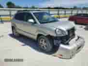 2007 Hyundai Tucson SE with VIN KM8JN12DX7U585485, listed as a Copart auction lot 69062935 with 162,217 mi miles and Salvage title. Bid and sale history available at DreamBid. Image 4.