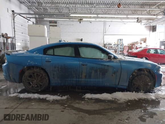 2023 Dodge Charger SXT with VIN 2C3CDXJG5PH620066, listed as a IAAI auction lot 41580011 with 24,783 mi miles and . Bid and sale history available at DreamBid. Image 13.