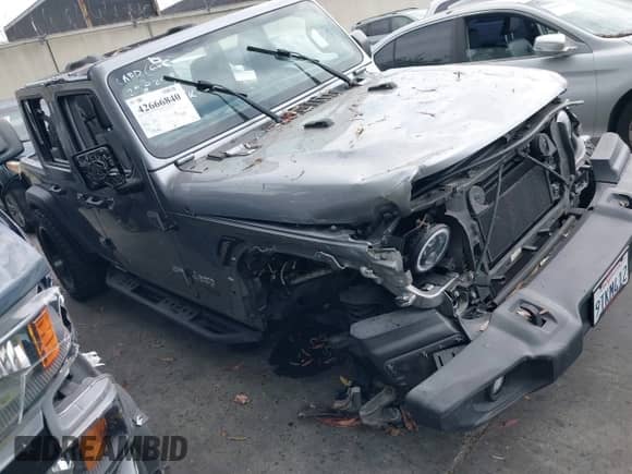 2021 Jeep Wrangler Unlimited 80th Anniversary z VIN 1C4HJXDG8MW519073, wystawiony jako IAAI lot #42666840 z przebiegiem 59 048 mil mil oraz . Historia ofert i sprzedaży dostępna na DreamBid. Obrazek 1.