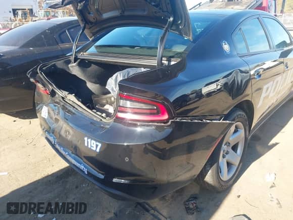 2022 Dodge Charger Police with VIN 2C3CDXAT3NH109952, listed as a IAAI auction lot 40919989 with 19,169 mi miles and . Bid and sale history available at DreamBid. Image 6.