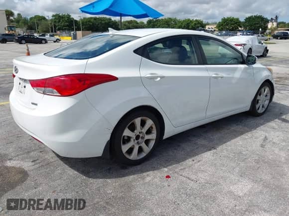 2013 Hyundai Elantra Limited z VIN 5NPDH4AE5DH159407, wystawiony jako IAAI lot #43213989 z przebiegiem 171 434 mil mil oraz . Historia ofert i sprzedaży dostępna na DreamBid. Obrazek 4.