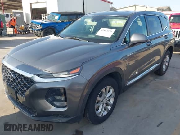 2019 Hyundai Santa Fe SE with VIN 5NMS2CAD1KH116655, listed as a IAAI auction lot 42865036 with 80,643 mi miles and . Bid and sale history available at DreamBid. Image 2.