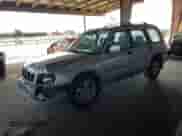 2002 Subaru Forester S with VIN JF1SF65602H712543, listed as a Copart auction lot 67325015 with 214,238 mi miles and Salvage title. Bid and sale history available at DreamBid. Image 1.