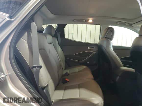 2016 Hyundai Santa Fe с VIN 5XYZWDLA4GG327488, выставлен на аукционе Copart как лот 82063675 с пробегом 73 376 миль миль и Списание • Salvage title. История ставок и продаж доступна на DreamBid. Изображение 11.