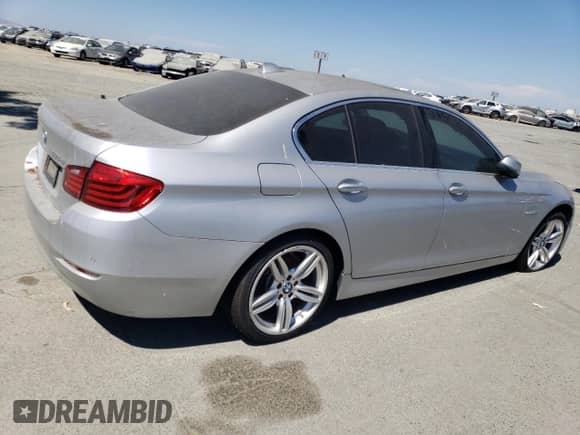 2014 BMW 5 Series 535d with VIN WBAXA5C50ED001873, listed as a Copart auction lot 62894625 with 128,251 mi miles and Salvage title. Bid and sale history available at DreamBid. Image 3.