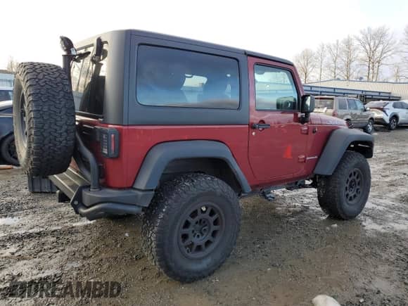 2013 Jeep Wrangler Rubicon with VIN 1C4HJWCG8DL520639, listed as a Copart auction lot 42458815 with 37,934 mi miles and Salvage title. Bid and sale history available at DreamBid. Image 3.