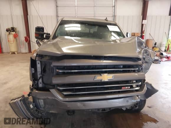 2017 Chevrolet Silverado 1500 LTZ z VIN 3GCUKSEJ4HG328926, wystawiony jako IAAI lot #41125958 z przebiegiem 248 071 mil mil oraz . Historia ofert i sprzedaży dostępna na DreamBid. Obrazek 19.
