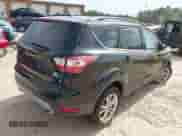 2018 Ford Escape SE with VIN 1FMCU9GD9JUC61180, listed as a IAAI auction lot 43228494 with 90,111 mi miles and . Bid and sale history available at DreamBid. Image 4.