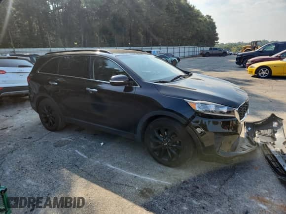 2019 Kia Sorento LX with VIN 5XYPG4A56KG597776, listed as a Copart auction lot 81047145 with 150,222 mi miles and Salvage title. Bid and sale history available at DreamBid. Image 4.