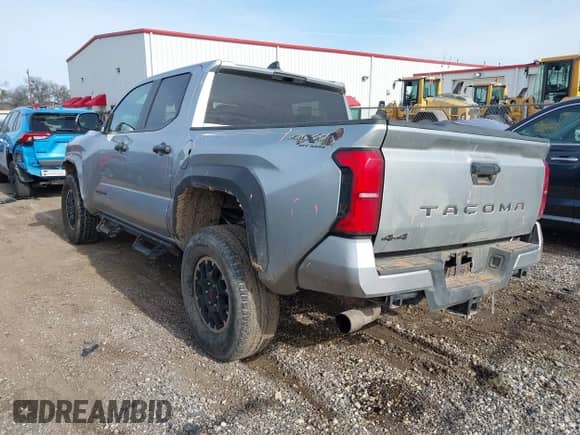 2024 Toyota Tacoma SR5 with VIN 3TYLB5JN0RT037837, listed as a IAAI auction lot 41315485 with 14,471 mi miles and . Bid and sale history available at DreamBid. Image 3.