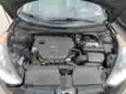 2012 Hyundai Veloster w/Gray Int z VIN KMHTC6AD8CU046631, wystawiony jako Copart lot #68106965 z przebiegiem 120 090 mil mil oraz Szkoda całkowita • Salvage title. Historia ofert i sprzedaży dostępna na DreamBid. Obrazek 11.