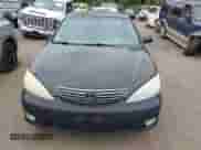 2005 Toyota Camry LE with VIN 4T1BE30K95U405962, listed as a IAAI auction lot 43040450 with 100,149 mi miles and . Bid and sale history available at DreamBid. Image 6.