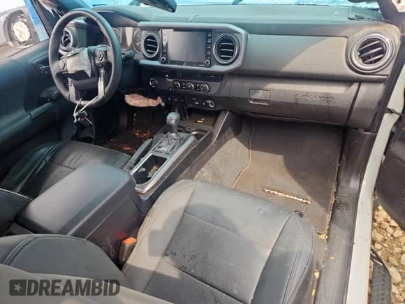 2023 Toyota Tacoma SR z VIN 3TYRZ5CN5PT033640, wystawiony jako Copart lot #69745075 z przebiegiem 14 471 mil mil oraz Szkoda całkowita • Salvage title. Historia ofert i sprzedaży dostępna na DreamBid. Obrazek 8.