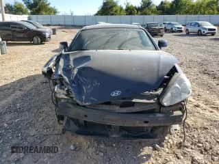 2008 Hyundai Tiburon GT с VIN KMHHN66F68U279070, выставлен на аукционе Copart как лот 74675574 с пробегом 92 020 миль миль и Списание • Salvage title. История ставок и продаж доступна на DreamBid. Изображение 5.