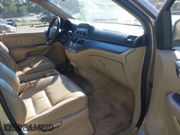 2007 Honda Odyssey EX-L z VIN 5FNRL38607B428946, wystawiony jako IAAI lot #43408399 z przebiegiem 188 636 mil mil oraz . Historia ofert i sprzedaży dostępna na DreamBid. Obrazek 5.