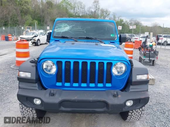2022 Jeep Wrangler Sport S with VIN 1C4GJXAG0NW145642, listed as a IAAI auction lot 42112670 with 8,737 mi miles and . Bid and sale history available at DreamBid. Image 12.